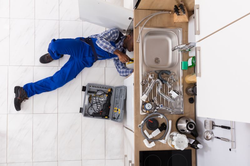 Plumber Installing Sink